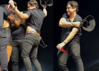 Fã invade palco e morde Natanzinho Lima em show