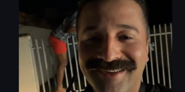 Sargento da PM flagra bandido preso em portão ao tentar roubar casa em Sinop; vídeo