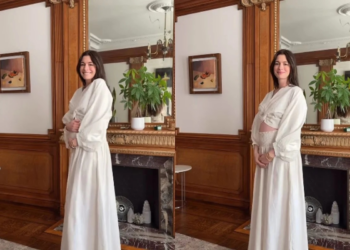 Anne Hathaway anuncia gravidez e mostra barrigão. Veja vídeo