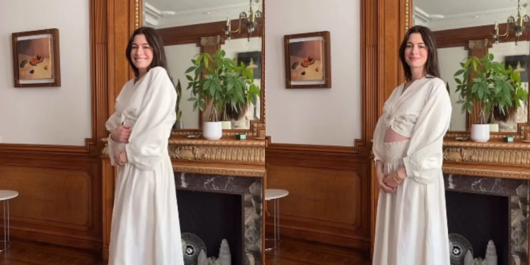 Anne Hathaway anuncia gravidez e mostra barrigão. Veja vídeo